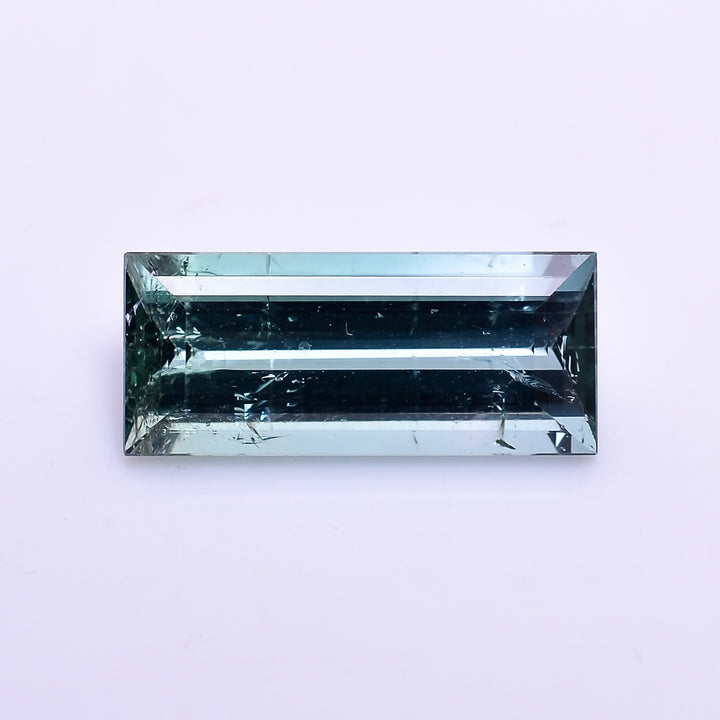 natural blue tourmaline rectangle shape facit cut stone slightly inclusion loose gemstone