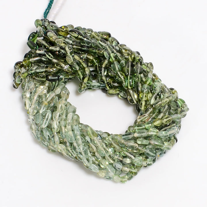 mint green tourmaline natural gemstone tumbled shape smooth 7 lines strand 16 beads 4x3 6x4 mm 261 ct yn 513