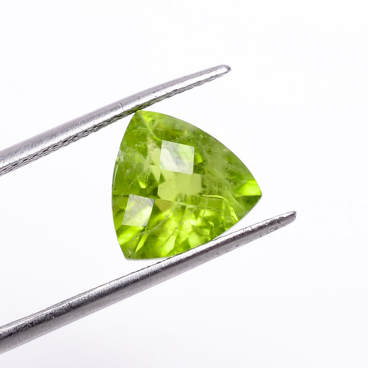 peridot natural trillion shape faceted loose gemstone