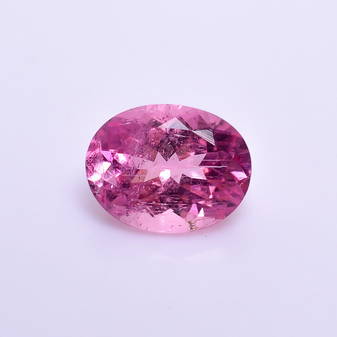 natural pink tourmaline oval shape facit cut stone slightly inclusion loose gemstone