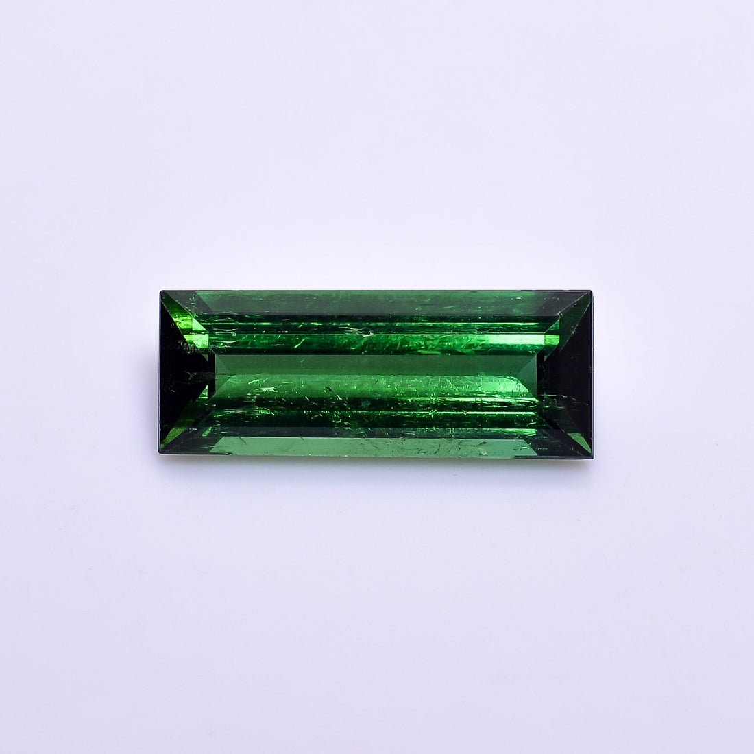 natural green tourmaline rectangle shape facit cut stone slightly inclusion loose gemstone