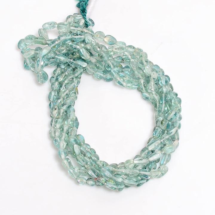 neon blue tourmaline natural gemstone tumbled shape smooth 3 lines strand 16 beads 4x3 6x4 mm 112 ct yn 517