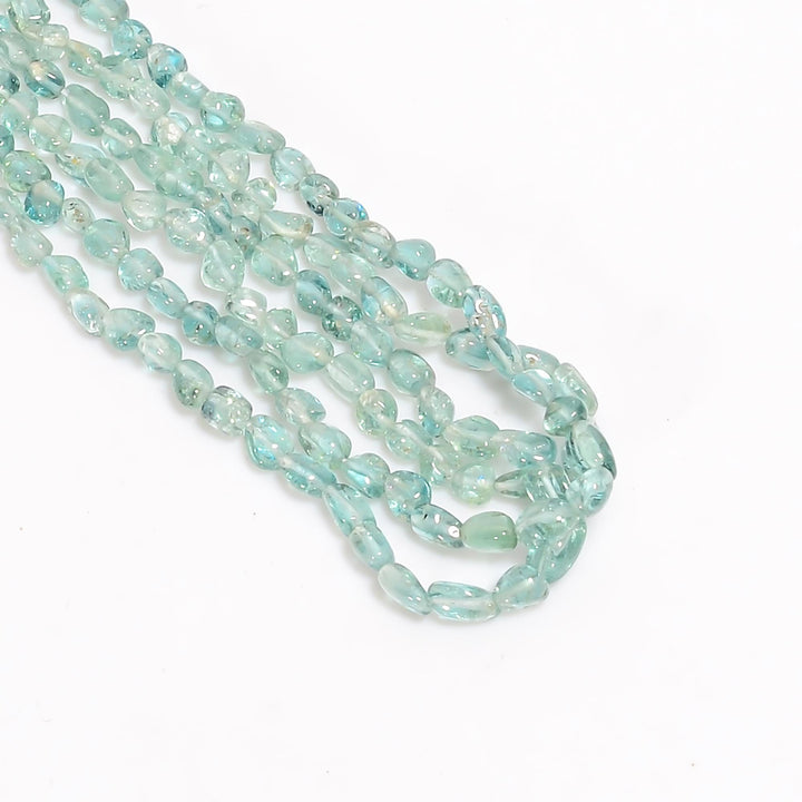 neon blue tourmaline natural gemstone tumbled shape smooth 3 lines strand 16 beads 4x3 6x4 mm 112 ct yn 517