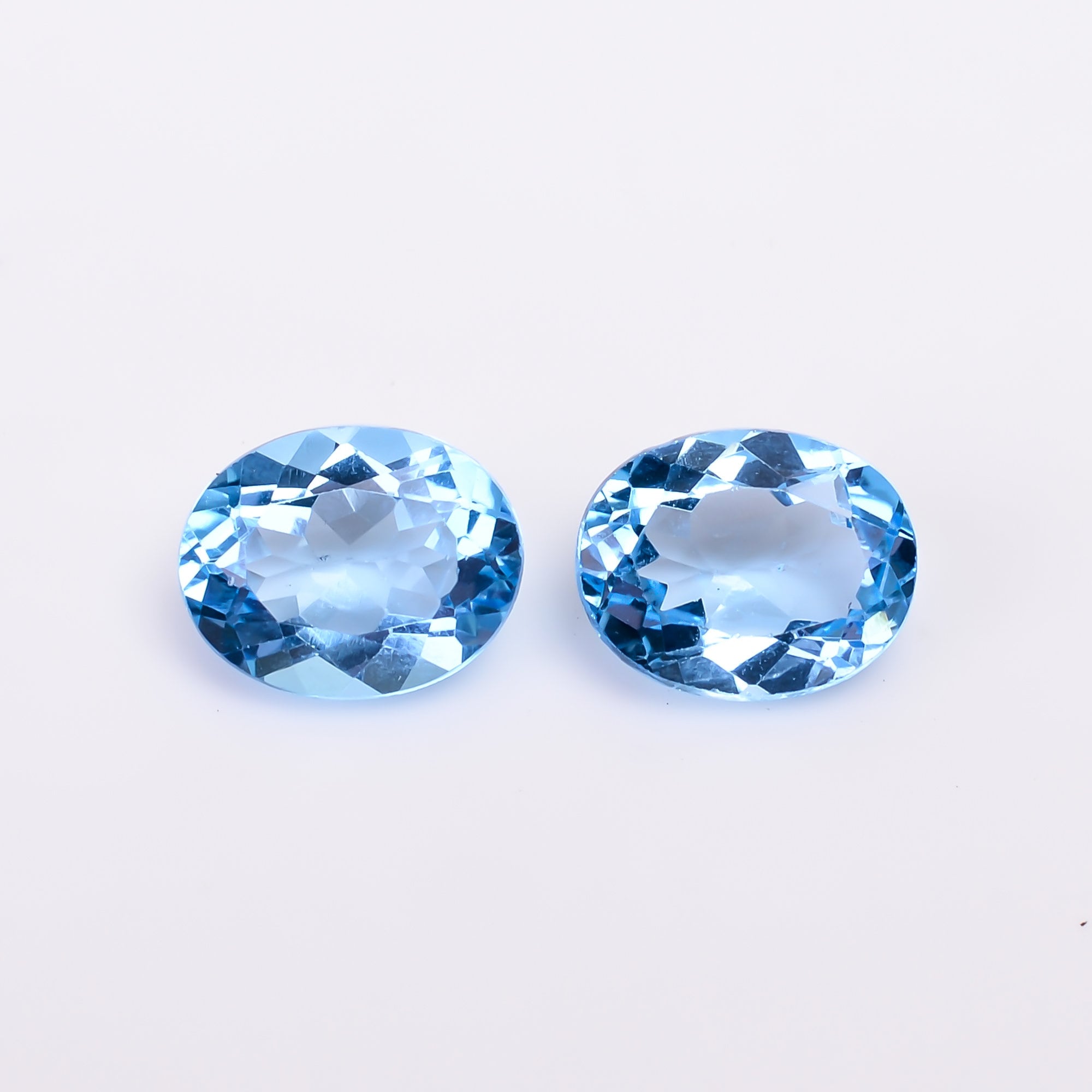 swiss blue topaz oval shape cut stone natural loose gemstone pair