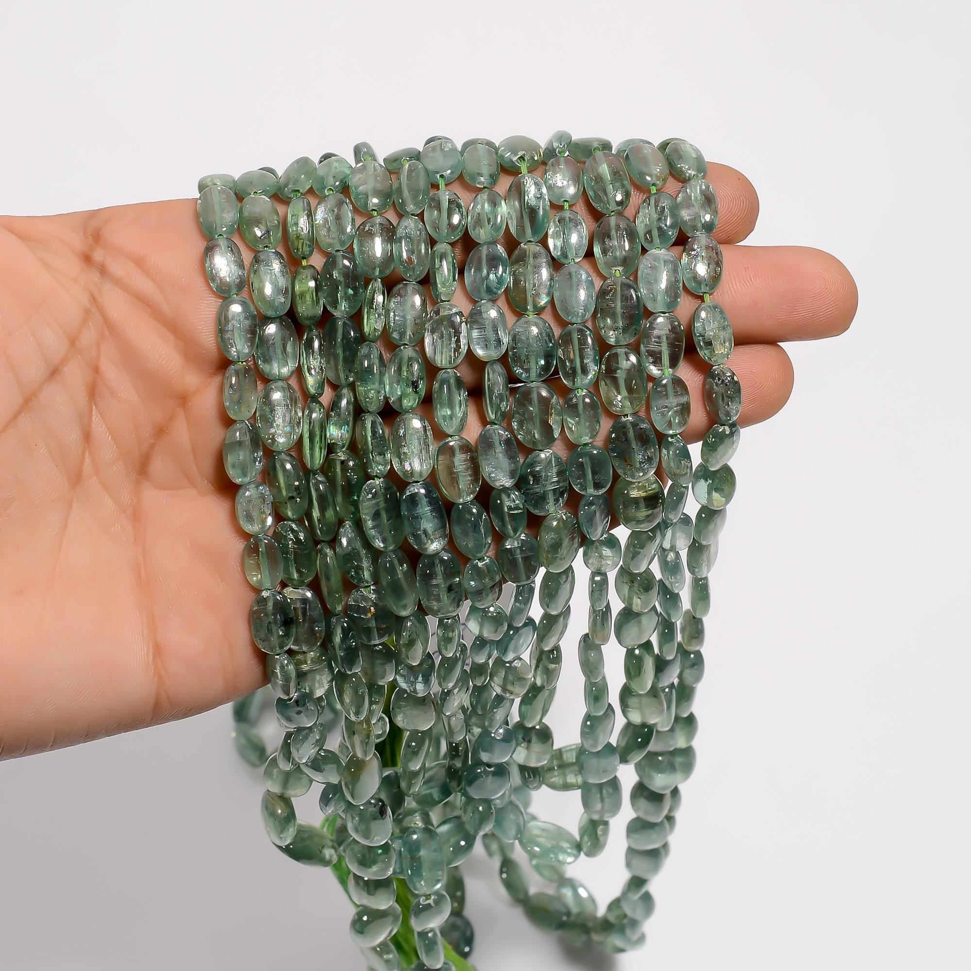 green kyanite natural gemstone oval shape smooth 