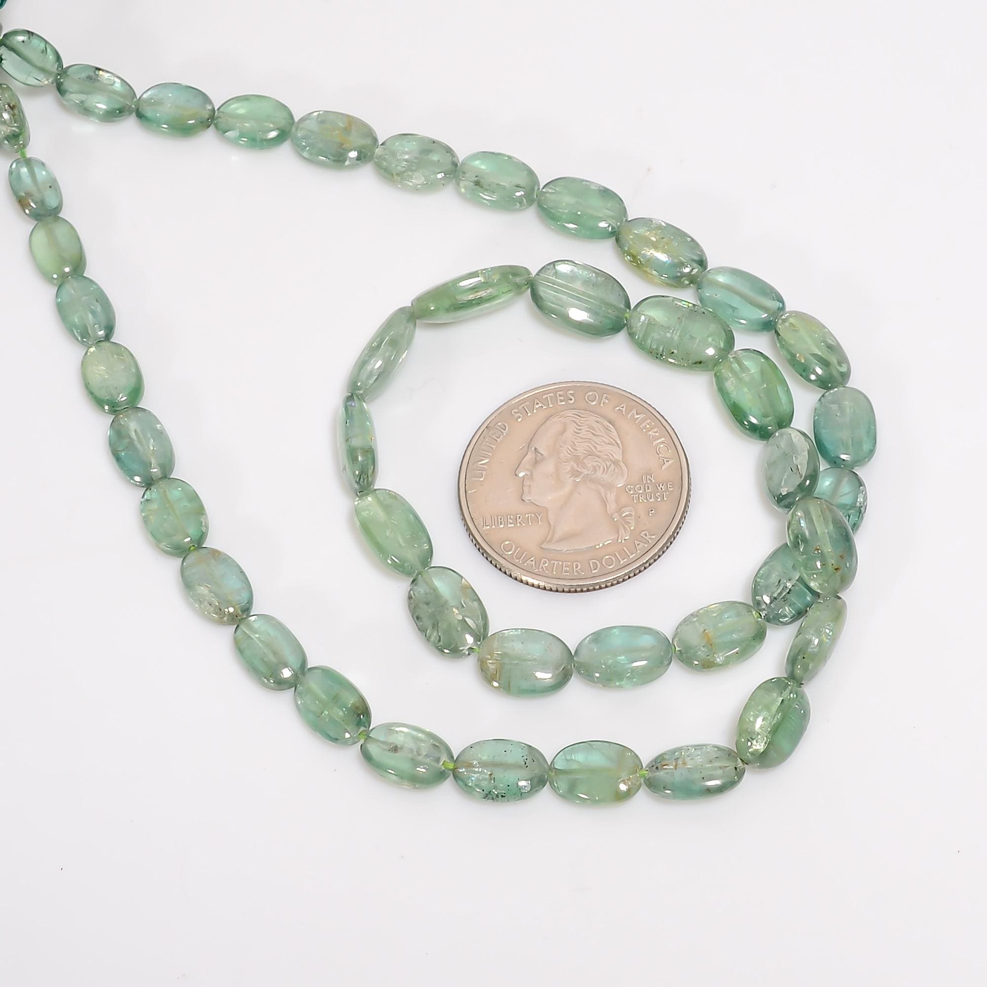 green kyanite natural gemstone oval shape smooth 