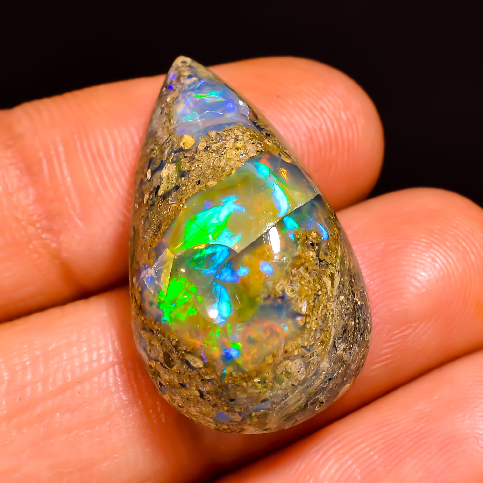 ethiopian opal with matrix pear shape cabochon loose gemstone