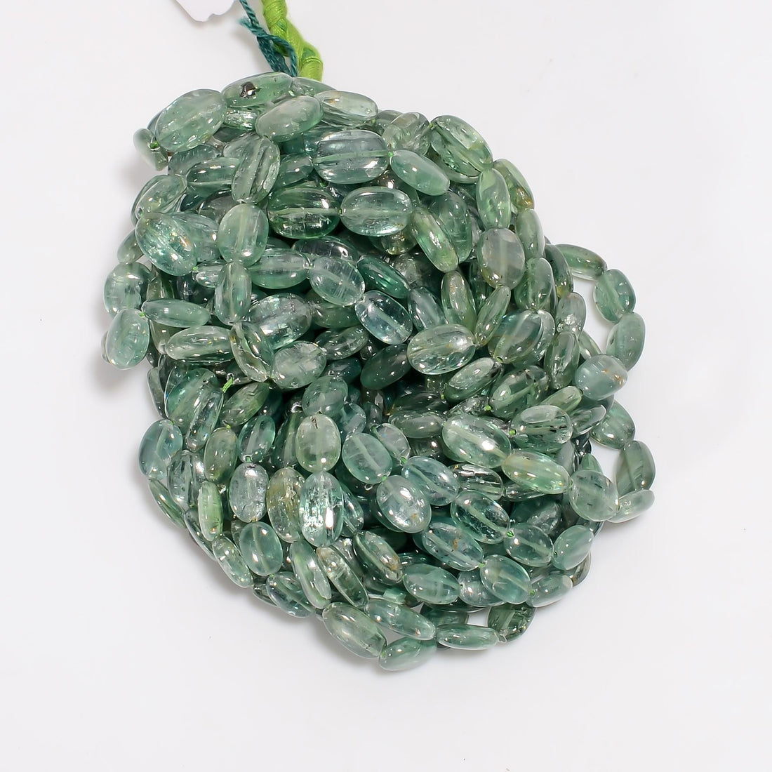 green kyanite natural gemstone oval shape smooth 