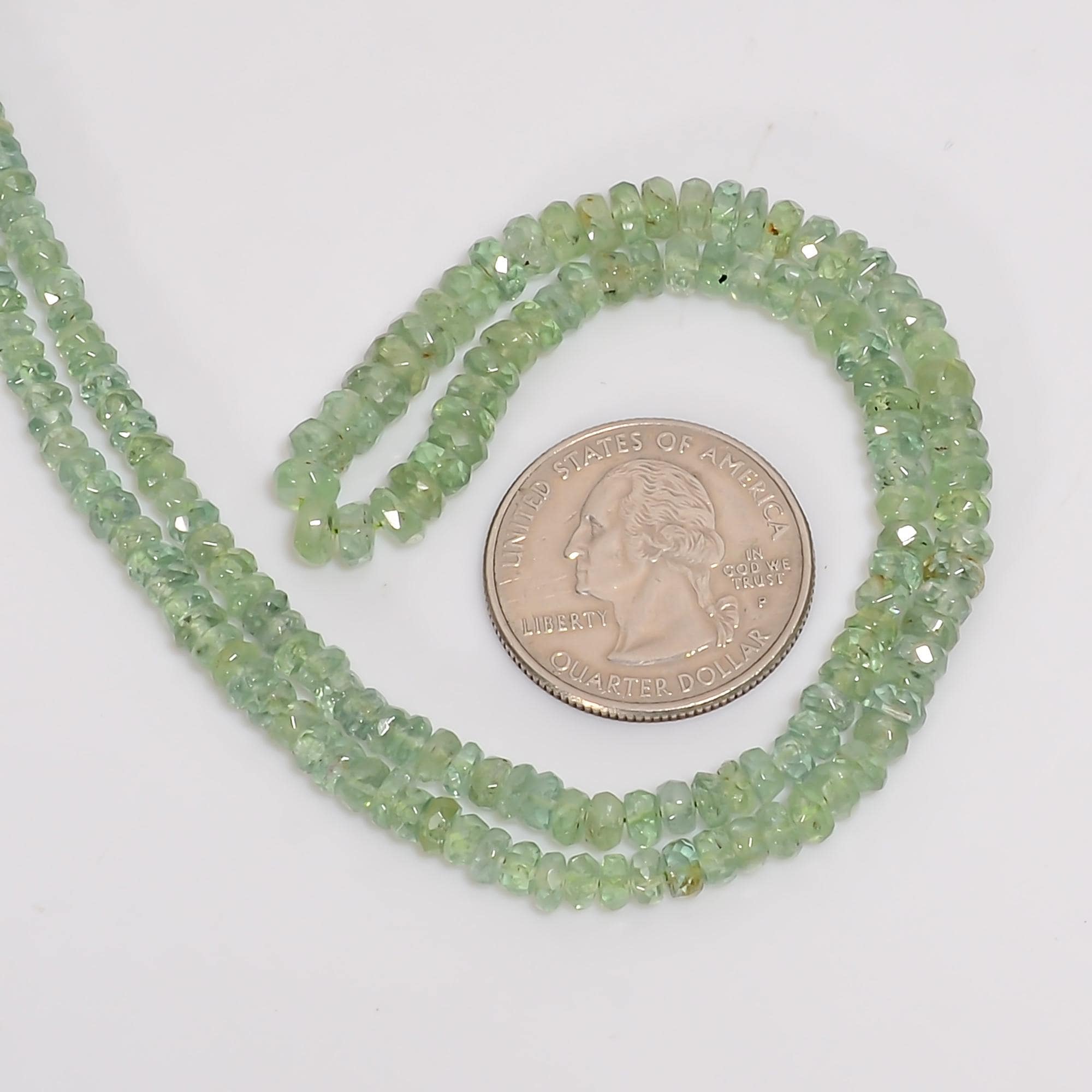 mint green kyanite natural gemstone rondelle shape faceted 
