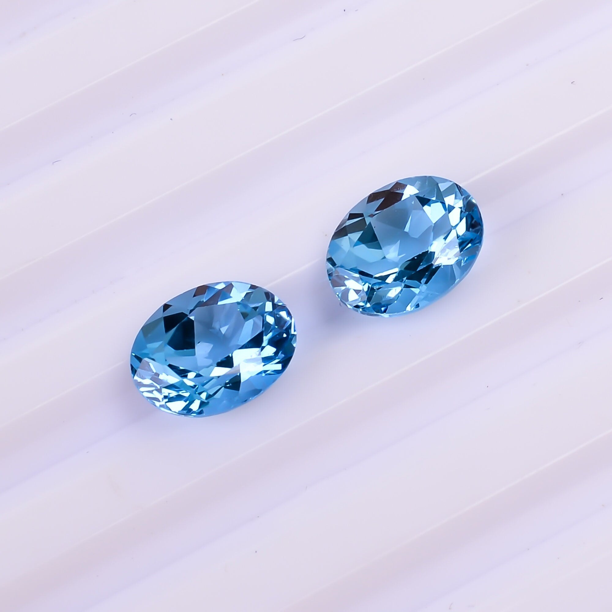 swiss blue topaz oval shape cut stone natural loose gemstone pair