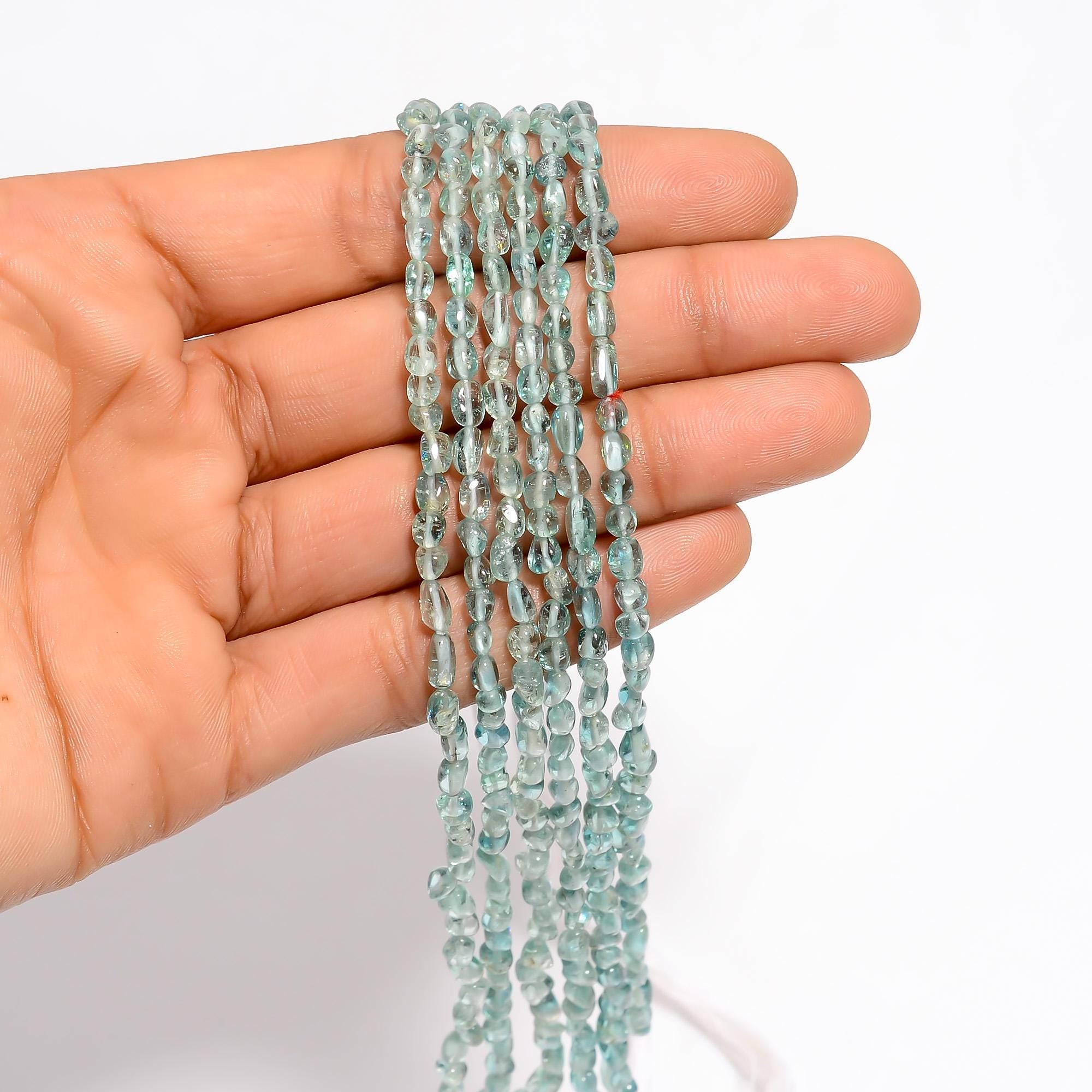neon blue tourmaline natural gemstone tumbled shape smooth 3 lines strand 16 beads 4x3 6x4 mm 112 ct yn 517
