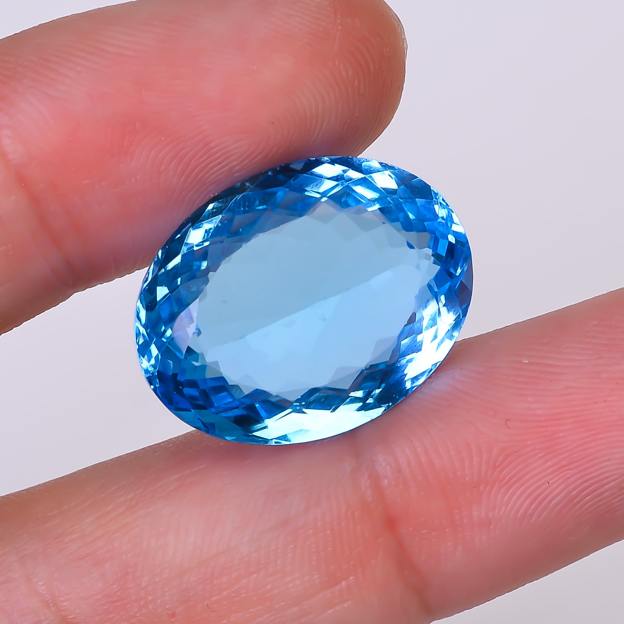 Natural Swiss Blue Topaz Oval Shape Cut Stone Loose Gemstone For Making Jewelry 27.5 Ct. 21X16X9 mm Y-10155