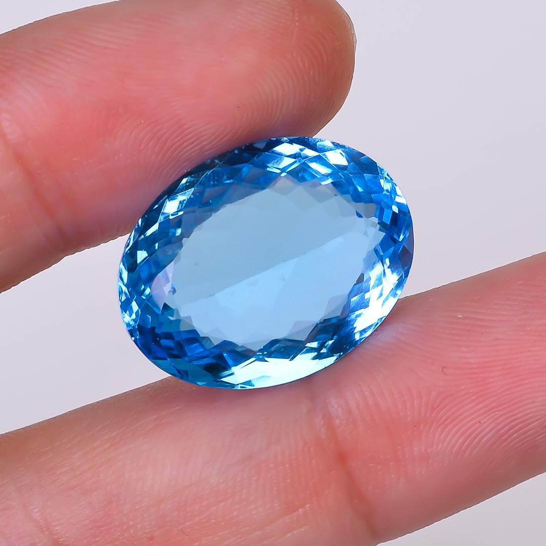 Natural Swiss Blue Topaz Oval Shape Cut Stone Loose Gemstone For Making Jewelry 27.5 Ct. 21X16X9 mm Y-10155