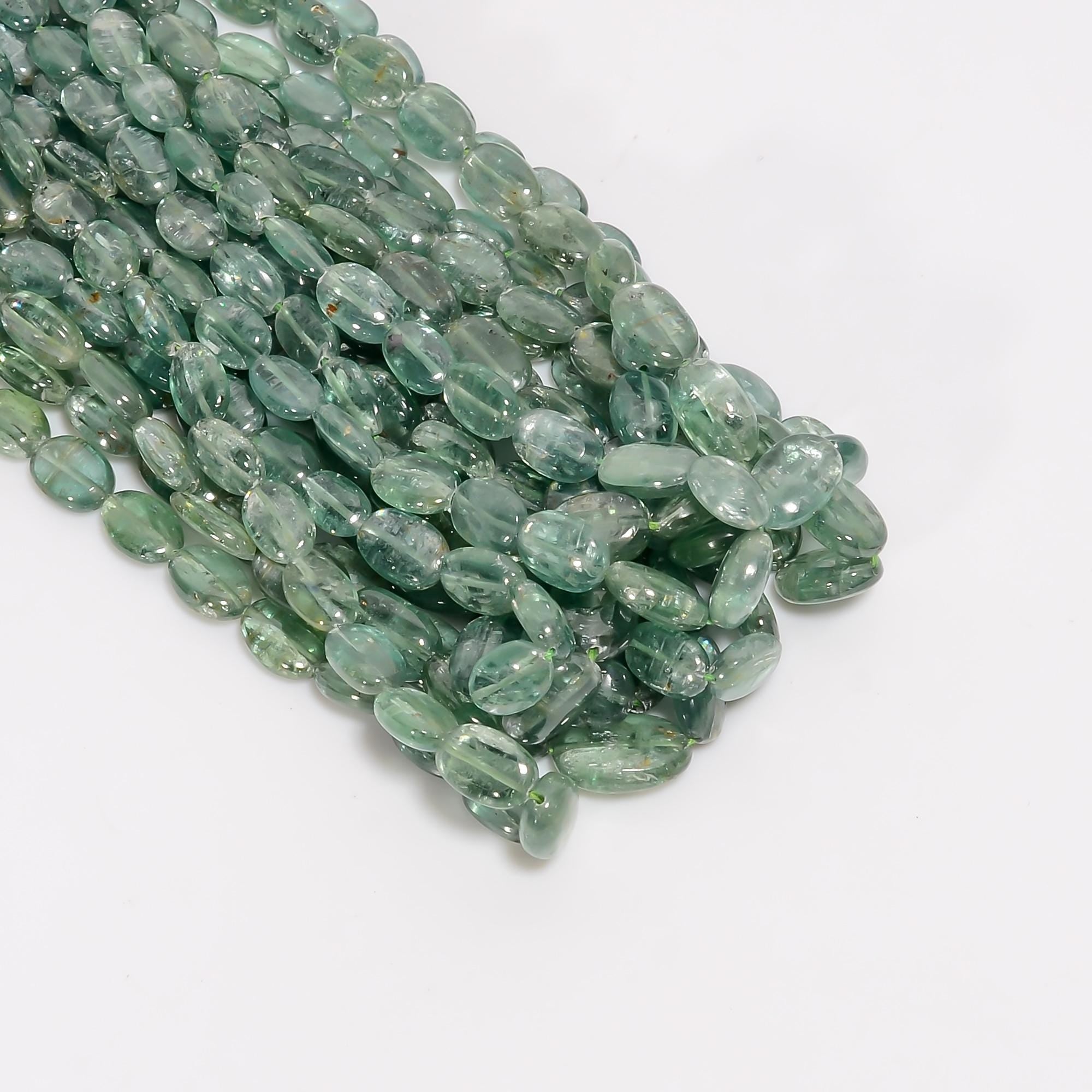 green kyanite natural gemstone oval shape smooth 