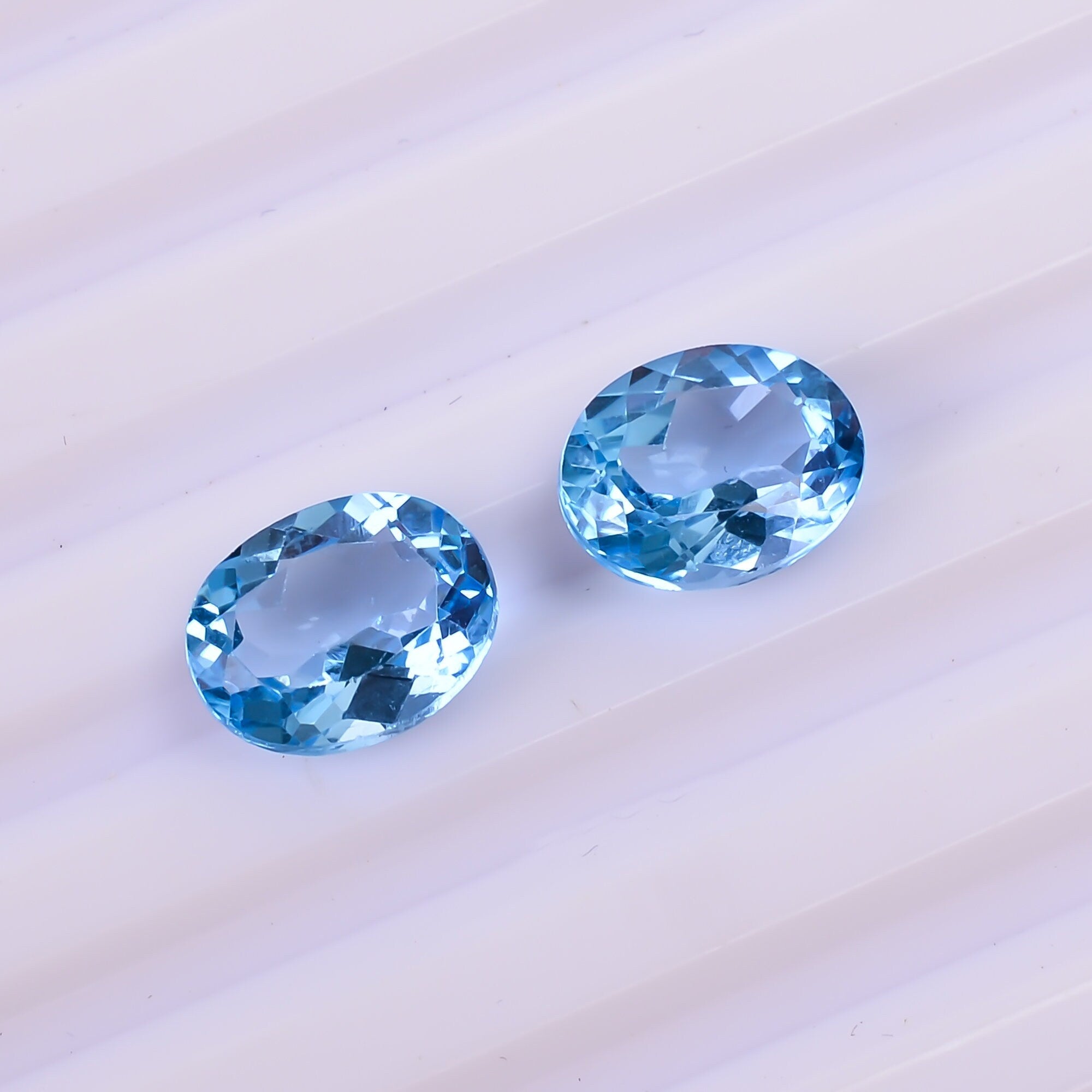 swiss blue topaz oval shape cut stone natural loose gemstone pair